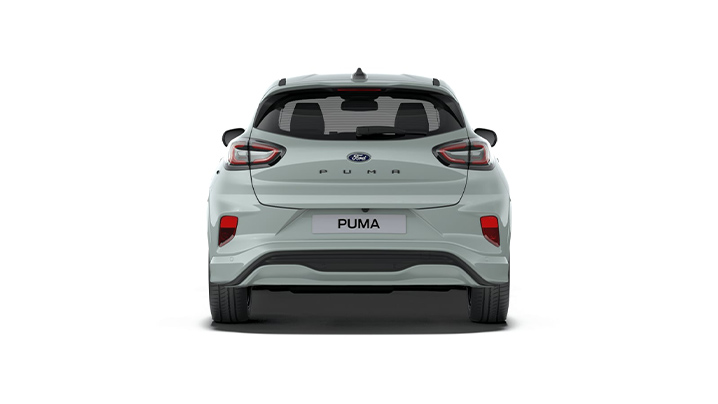 Hinteransicht eines Ford Puma in heller Farbe, mit der Modellbezeichnung PUMA sichtbar auf dem Heck.
