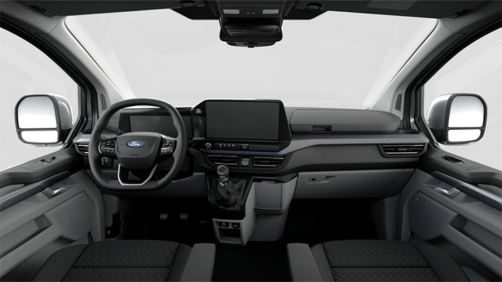 Innenansicht eines Ford-Fahrzeugs mit Lenkrad, Display und Armaturenbrett in modernem Design.