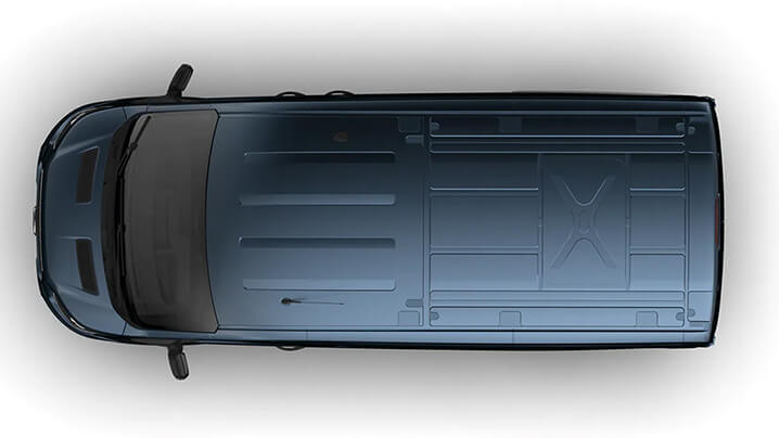 Draufsicht auf ein dunkelblaues Fahrzeug mit flachem Dach und minimalistischer Oberfläche.